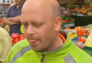 Aug 18 - man in Flourescent jacket pelts Ed Milliband with eggs.